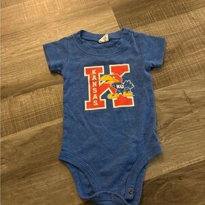 Charlie Hustle Blue Kansas Jayhawks onesie